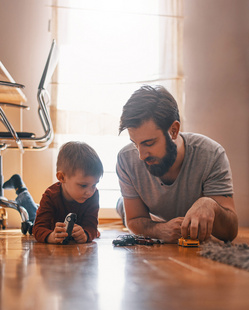 dad playing with his kid